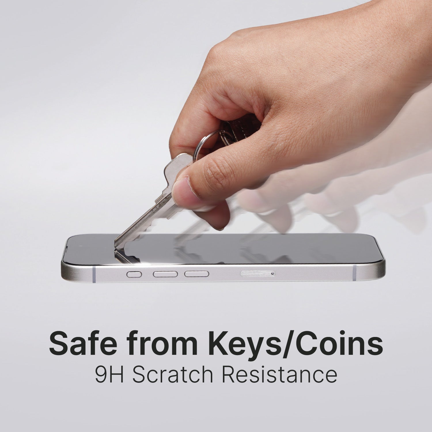 A hand holding a key scratches an iPhone screen with the text "Safe from Keys/Coins - 9H Scratch Resistant" displayed below the Catalyst iPhone 16 Tempered Glass Screen Protector.